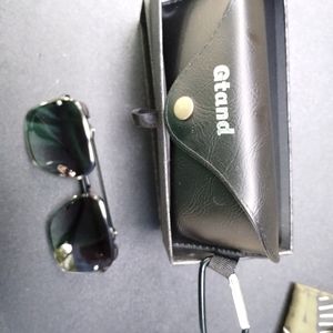 Men's all black sunglasses comes with case and extra nose pads.